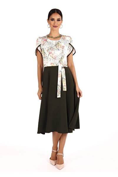 AD Fashion Office dress with floral printed bust on a white background and plain dark khaki pleated skirt, accessorized with c