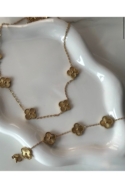 Stainlless Steel طقم مكون من قلادة وسوار أنيق بتصميم زهور باللون الذهبي على ا...