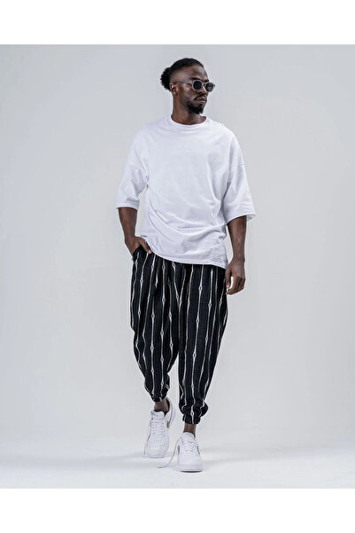 hazelin Erkek Siyah Çizgi Desenli Beli ve Paçası Lastikli Bol Kesim Jogger Eş...