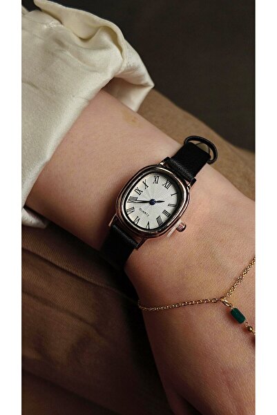 Melinora Rivka Ivory Oval Wavy Pattern White Dial Black Leather Cord Women Wristwatch