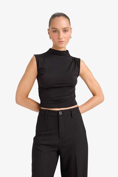 DeFacto Slim Fit Dar Kesim Yarım Balıkçı Yaka Kolsuz Bluz F6908AX25AU