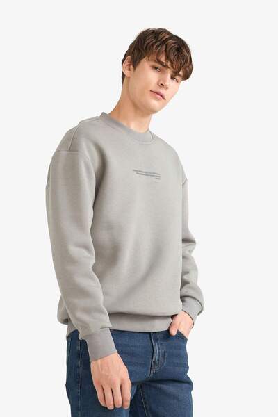 DeFacto Boxy Fit Bisiklet Yaka İçi Yumuşak Tüylü Baskılı Sweatshirt X8282AZ25AU