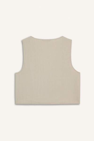 DeFacto Regular Fit V Yaka Bağlamalı Krinkıl Kumaş Kolsuz Bluz F0617AX25SM