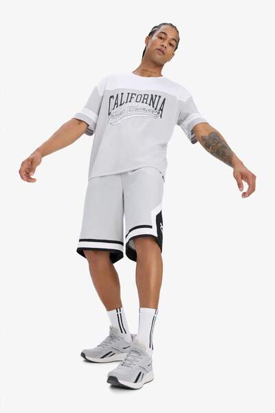 DeFacto DeFactoFit Hızlı Kuruyan Oversize Geniş Kalıp Sporcu Kısa Paça Şort E4128AX25SM