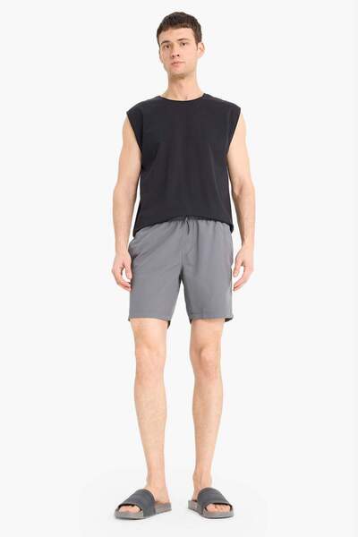 DeFacto Reguläre Passform, kurze Größe, Taschen, Netzstoff, gefütterte Taille, Schnürung, einfarbig, leichte Stoff-Badeshorts E5133AXNS