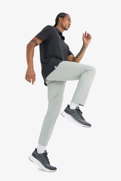 DeFacto DeFactoFit Slim Fit Dar Kesim Standart Paça Dokuma Sporcu Pantolon E3333AX25SP