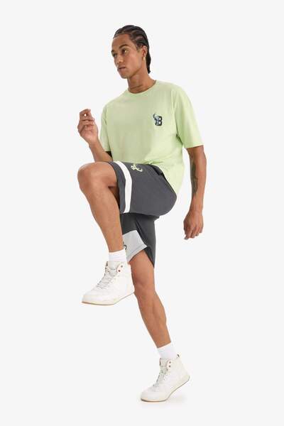 DeFacto DeFactoFit NBA Milwaukee Bucks Standart Fit Kısa Paça Şort E0212AX25SP