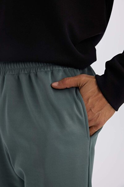 DeFacto DeFactoFit Sporcu Jogger Eşofman Altı Standart Fit Basic Düz Cepli Beli Paçası Lastikli D3742AX24WN