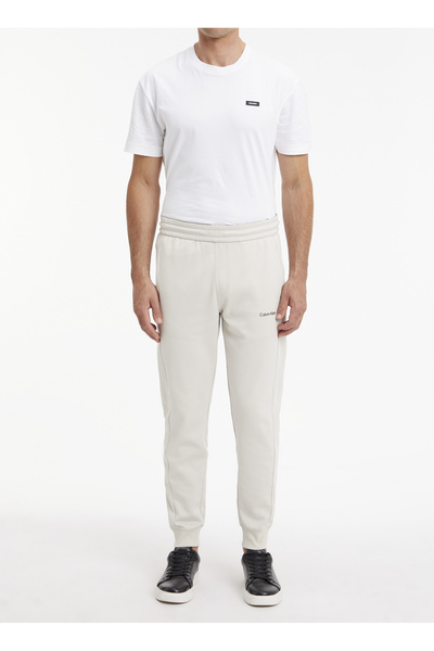 Calvin Klein Erkek Pamuklu Relaxed Fit Yüksek Bel Bej Spor Eşofman Altı K10k1...