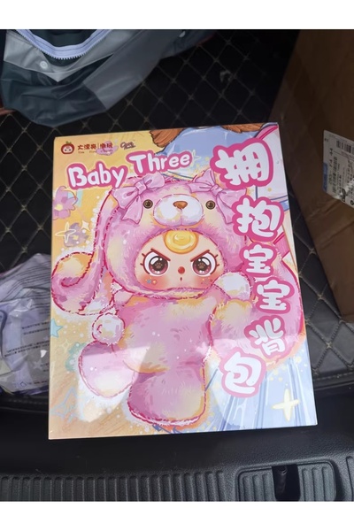 Miniso حقيبة ظهر قطيفة من سلسلة Baby-Three Embracing Baby الأصلية بشكل عشوائي...