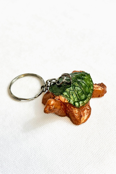 Uretti سلسلة مفاتيح سلحفاة مصنوعة يدويًا من هوليا 6683 6767، تمثل رمز الحظ وا...