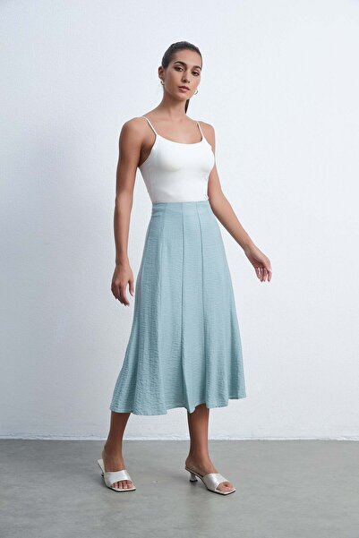 Livia تنورة ميدي فضفاضة سادة