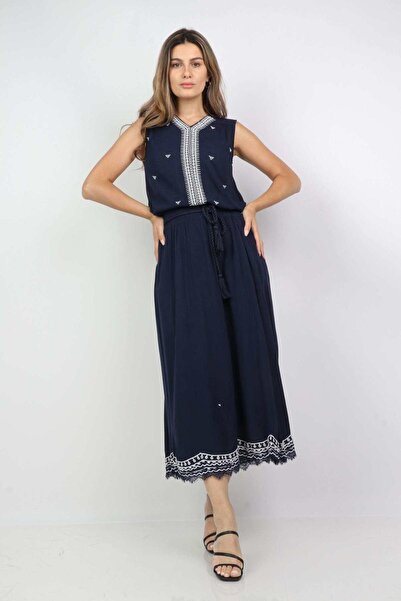DALYDRESS تنورة ميدي سادة مع نقوش