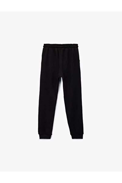 Koton Βαμβακερό μαύρο αγορίστικο παντελόνι με λεπτομέρεια με φερμουάρ 6Wkb40045Tk