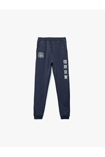 Koton Ανδρικό παντελόνι Jogger Navy Blue με λεπτομέρεια εκτύπωσης με κορδόνι ...