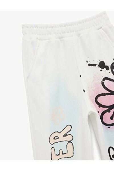 Koton Şardonlu Beli Lastikli Baskılı Jogger Ekru Kız Çocuk Eşofman Altı 6Wkg40049Ak