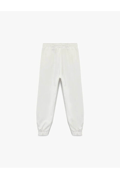 Koton Şardonlu Beli Lastikli Baskılı Jogger Ekru Kız Çocuk Eşofman Altı 6Wkg40049Ak