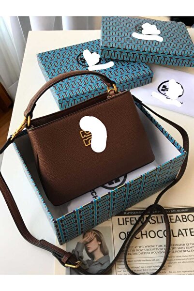 GUEE Shoulder bag, an exact copy of the famous brand. It comes with a box, a bag, and a warranty card with the same brand name.