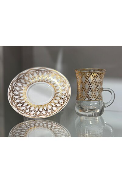 Bin Shihoun 21-piece tea and coffee serving set with a distinctive rose gold pattern