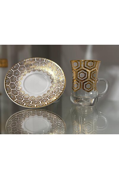 Bin Shihoun 21-piece tea and coffee serving set with a distinctive rose gold pattern