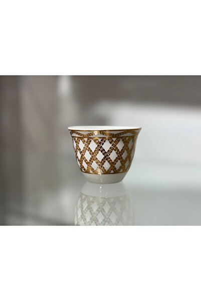 Bin Shihoun 21-piece tea and coffee serving set with a distinctive rose gold pattern