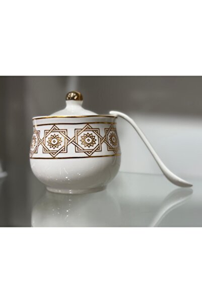 Bin Shihoun 21-piece tea and coffee serving set with a distinctive rose gold pattern