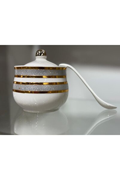 Bin Shihoun 21-piece tea and coffee serving set with a distinctive rose gold pattern