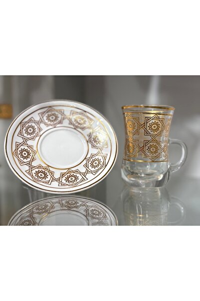 Bin Shihoun 21-piece tea and coffee serving set with a distinctive rose gold pattern