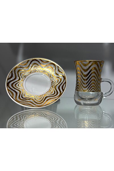 Bin Shihoun 21-piece tea and coffee serving set with a distinctive rose gold pattern