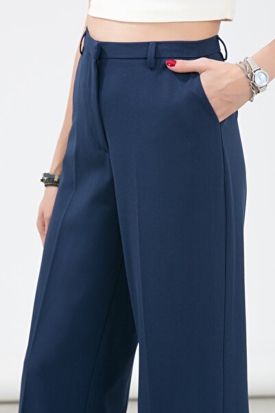 LA PANTE بنطلون منسوج بتصميم بوتشي باتشي