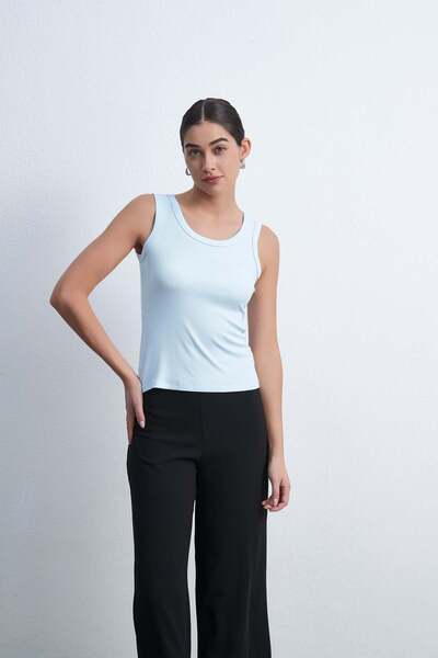 Livia Solid Sleeveless Crew Neck Top
