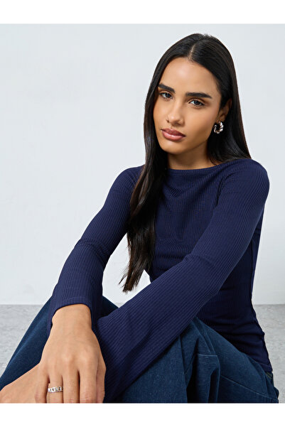 Styli Ribbed Knit Flared Long Sleeve Top