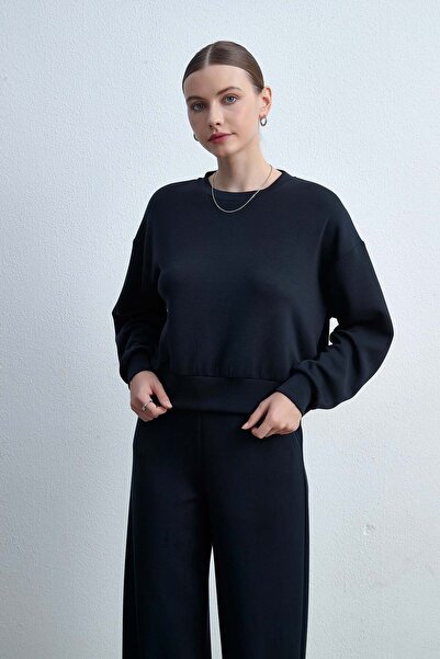 Livia بلوزة سادة بأكمام طويلة