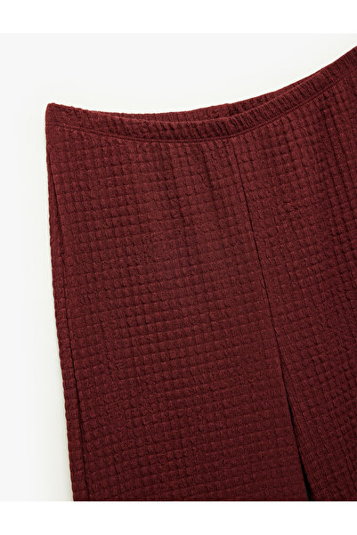 Koton Beli Lastikli Dokulu Geniş Paça Pantolon