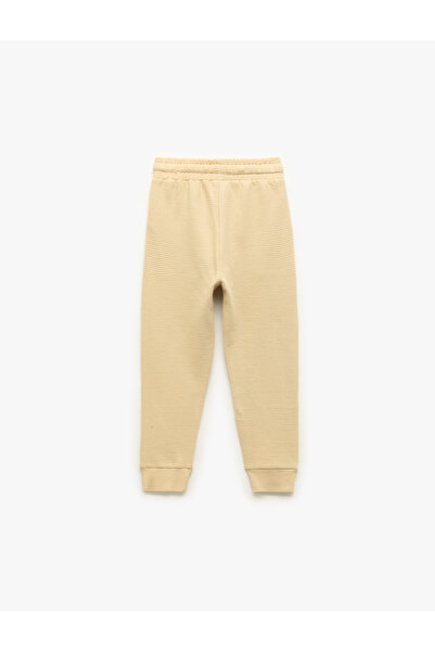 Koton Памучни панталони с джобове и детайли