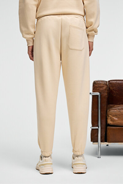 GRIMELANGE Ansel Men's Elastic Narrow Leg Three-Pocket Soft Organic Cotton Vanilla Sweatpants