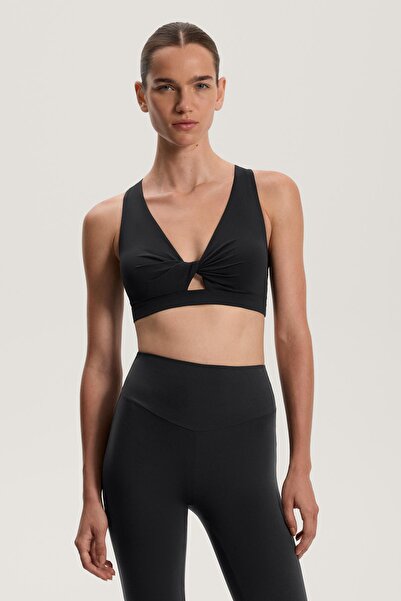 Oysho Orta destekli cup'lı twist Comfortlux spor sütyeni