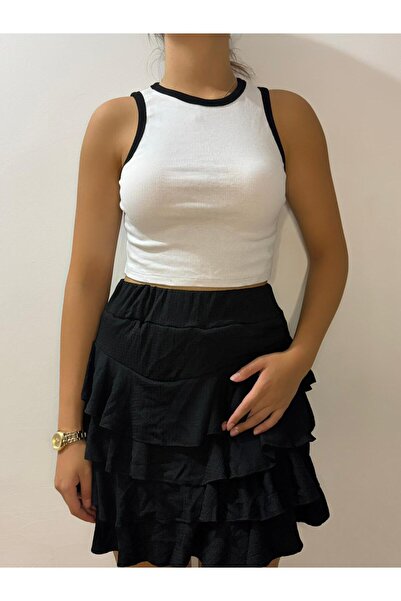 VİZORA BUTİK تنورة قصيرة سوداء من القماش المجعد