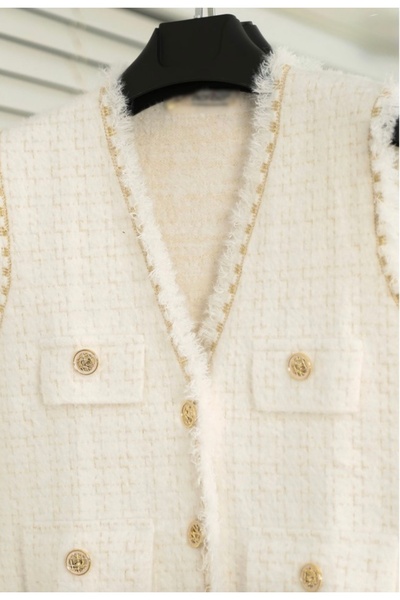 BURKAY Gold Button Details, Elegant Texture, and Modern Cut Make the Vest.