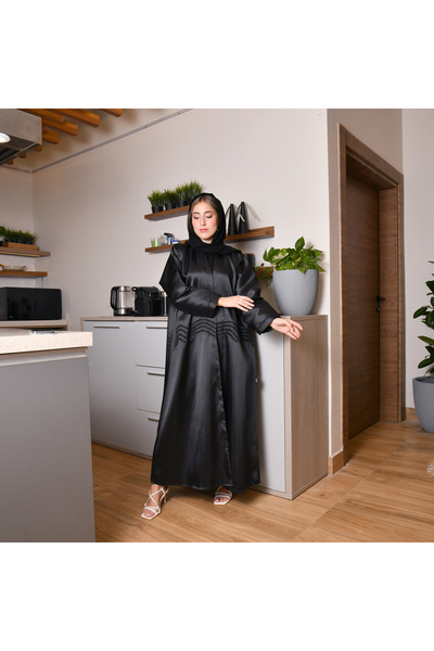 HAWRAA Wrap abaya made of standing taffeta with black wavy embroidery