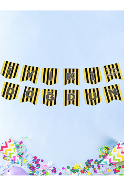 Umamiçe لافتة مكتوب عليها باللون الأصفر والأزرق الداكن 'أهلاً بنا على عيد ميل...