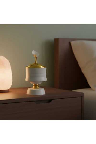 GIFT مبخره بلون لابيض براس دهبي