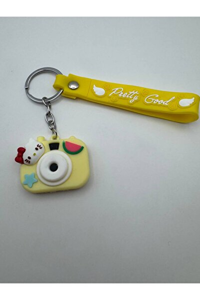 Yuchicly سلسلة مفاتيح بشخصية كورومي مع كاميرا سيليكون صفراء - حامل مفاتيح جمي...