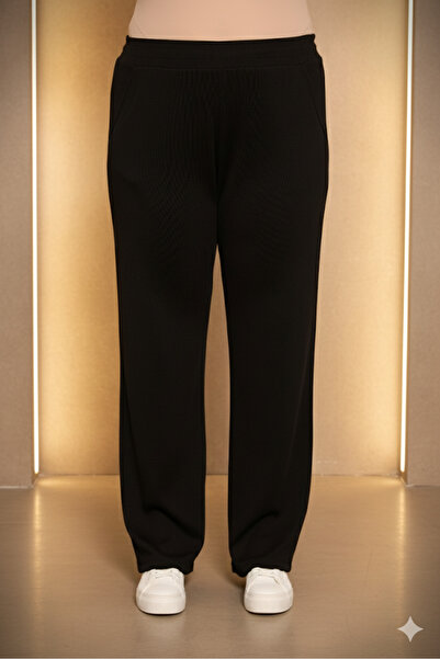 RMG بنطلون محبوك أسود كبير الحجم مع خصر مطاطي