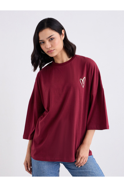 Styli Women Oversized Fit Longline Slogan T-Shirt
