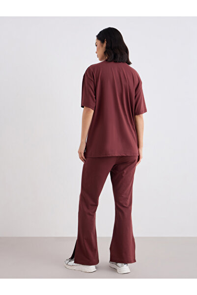 Styli Women Oversized T-Shirt and Flared Leggings Co-Ords