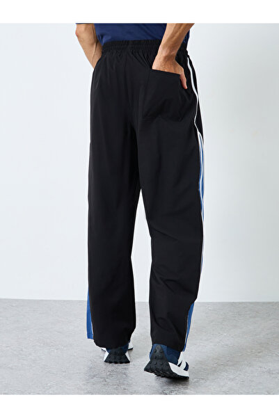 Styli Oversized Fit Cut and Sew Detail Parachute Pant