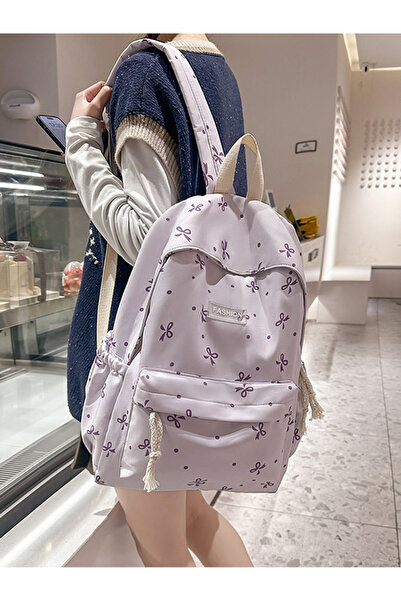 Take Two By Styli حقيبة ظهر بسحاب وطبعة فيونكة جرافيكية