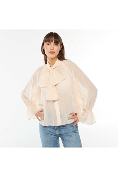 KIABI بلوزة متدفقة مع فيونكة وأكمام مكشكشة باللون البيج