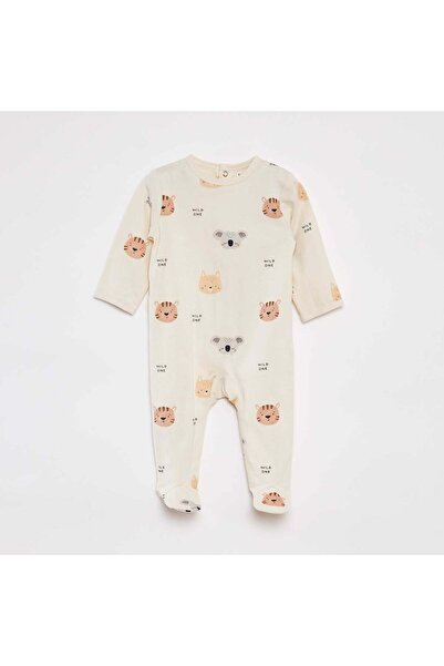 KIABI بدلة نوم منقوشة بأقدام باللون الأبيض